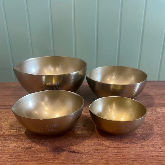 Brass measuring cups